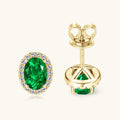 Elegant Oval Simulated Emerald Stud Earrings with Crystal Halo in Sterling Silver