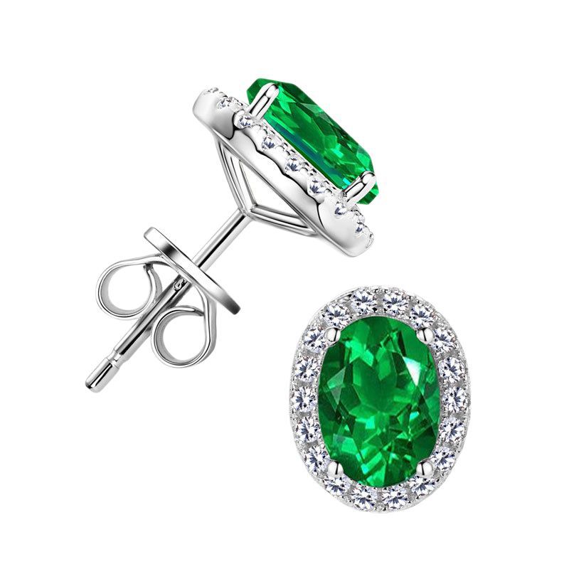 Elegant Oval Simulated Emerald Stud Earrings with Crystal Halo in Sterling Silver